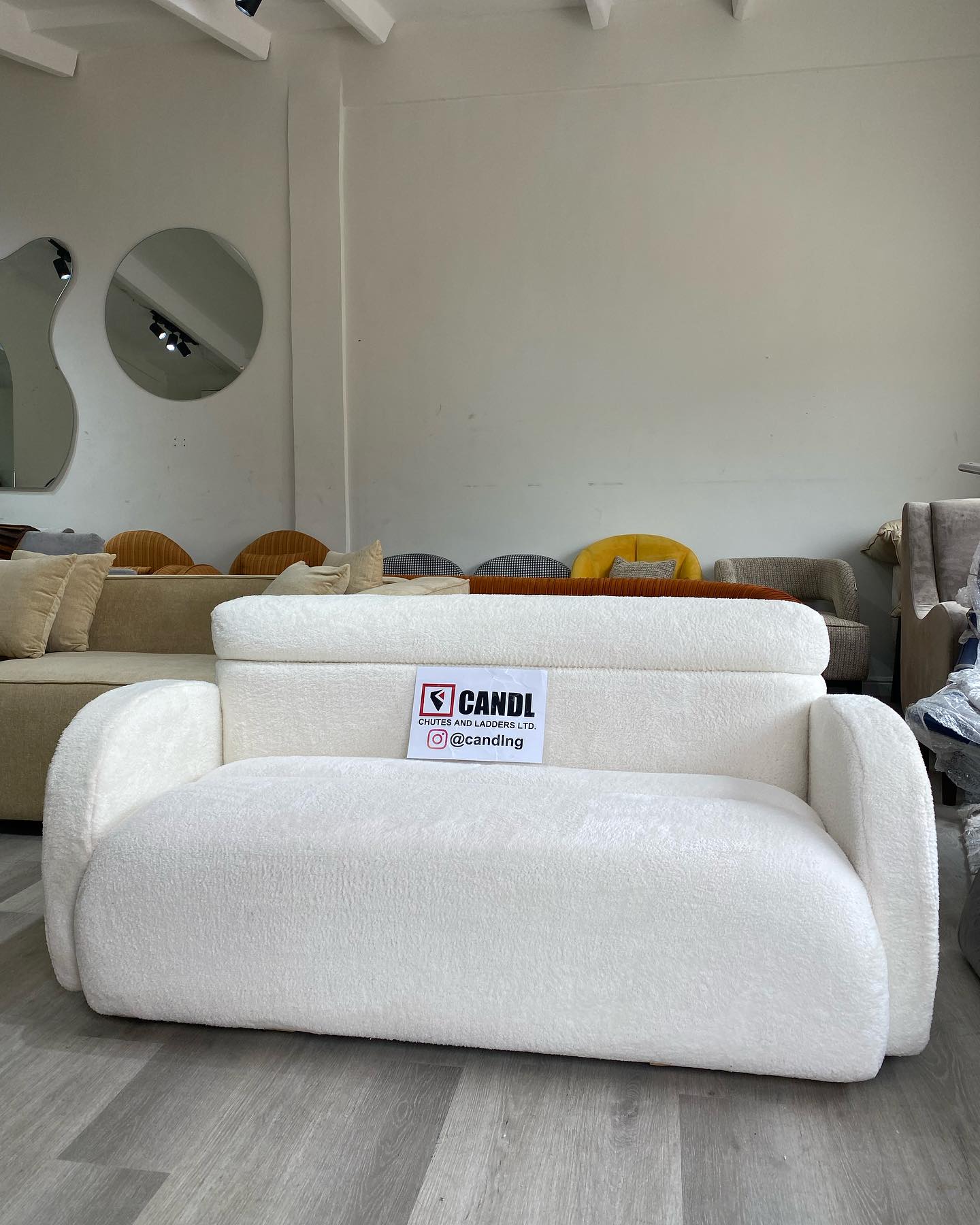 2-Seater sofa made with white boucle fabric