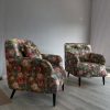 Accent chairs made with floral fabric with wooden legs