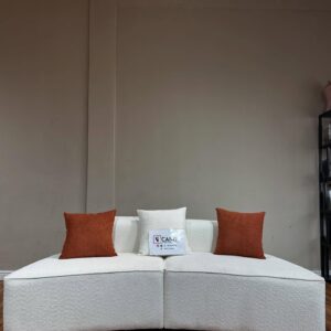 Creamy boucle paired with rust-tone accents