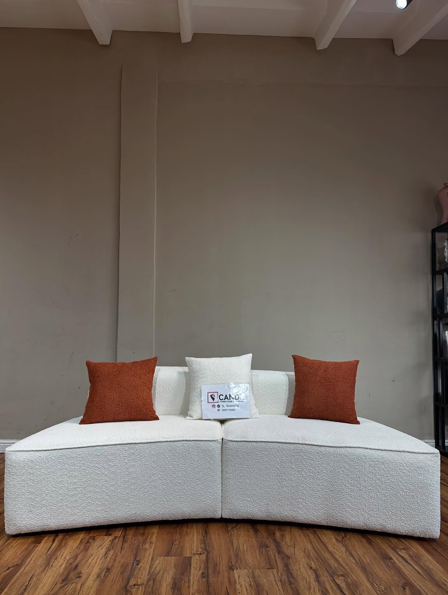 Creamy boucle paired with rust-tone accents