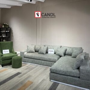 L-shape, paired with a bold accent chair and plush ottoman