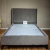 Grey bedframe with wooden legs