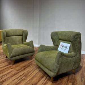 Curved accent sofa statement in green/ burnt orange