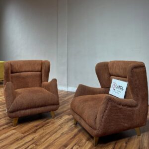 Curved accent sofa statement in green/ burnt orange