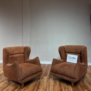 Curved accent sofa statement in green/ burnt orange