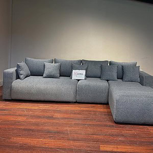 sectional sofa in grey fabric