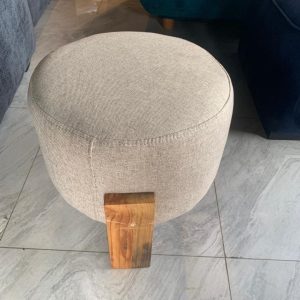 CANDL statement ottoman made with wooden legs