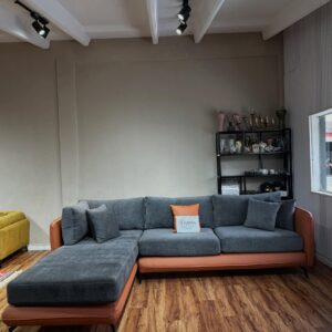 L-shaped with leather and soft elegance of fabric.