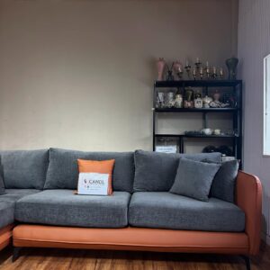 L-shaped with leather and soft elegance of fabric.